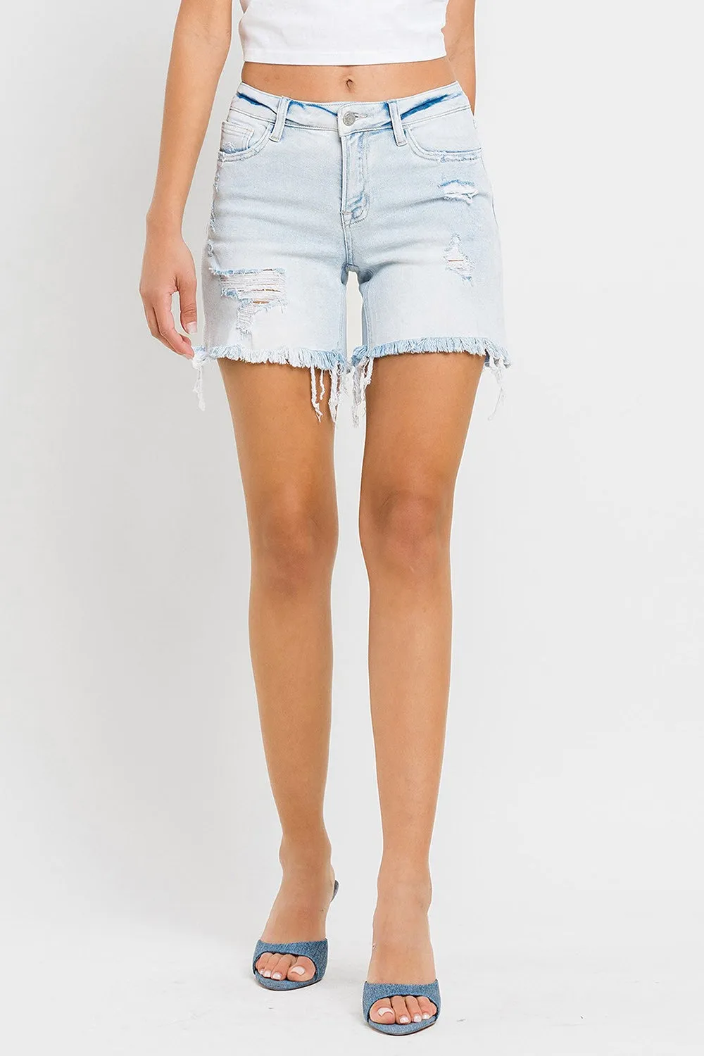 MID RISE DISTRESSED STRETCH SHORTS